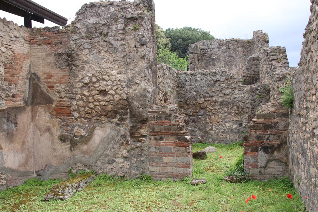 VIII.3.7 Pompeii. May 2024.
Looking towards doorway to rear room in south wall of shop-room. Photo courtesy of Klaus Heese.