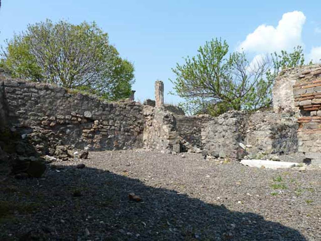 VIII.3.15 Pompeii. May 2010. Looking west from entrance.
On the left would have been the stairs to upper floor, latrine and with a hearth at rear.
In the centre, the doorway to the triclinium can be seen. On the right can be seen the entrance to the corridor to the garden area.