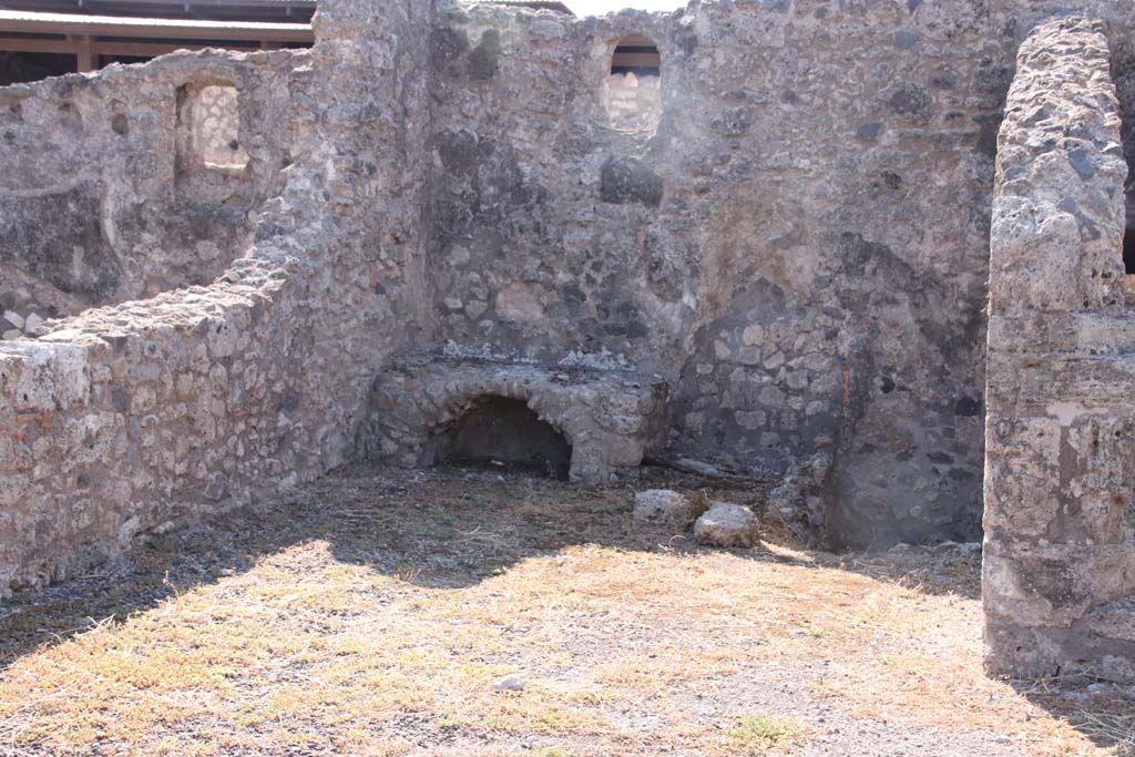 VIII.3.18 Pompeii. September 2021.
Looking south-east across atrium towards right ala, being used as a kitchen with hearth. Photo courtesy of Klaus Heese.