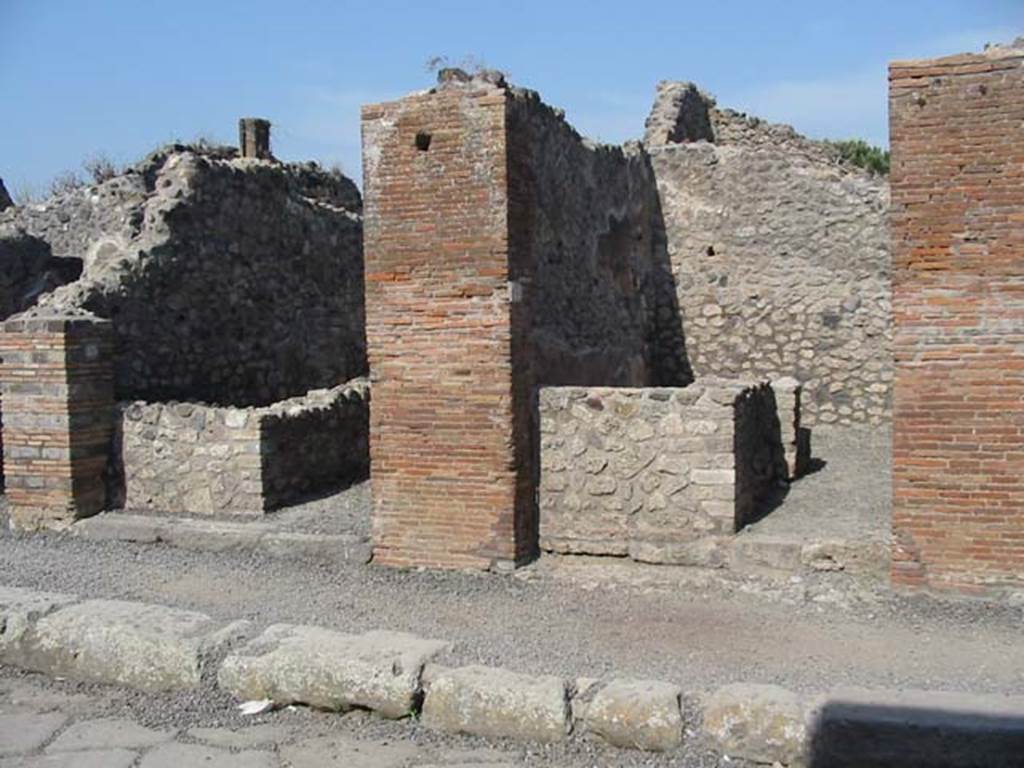 VIII.3.23, on left, and VIII.3.22, Pompeii. May 2003. Looking east to entrances. Photo courtesy of Nicolas Monteix.