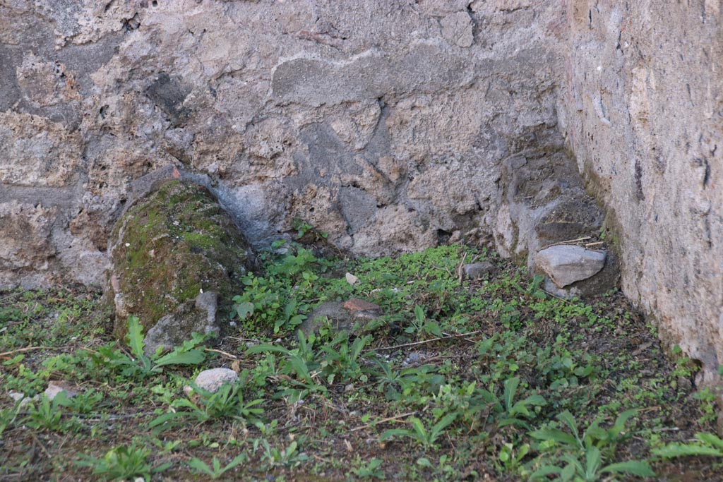 VIII.3.23 Pompeii. October 2022. Possible latrine in south-east corner of rear room. Photo courtesy of Klaus Heese.