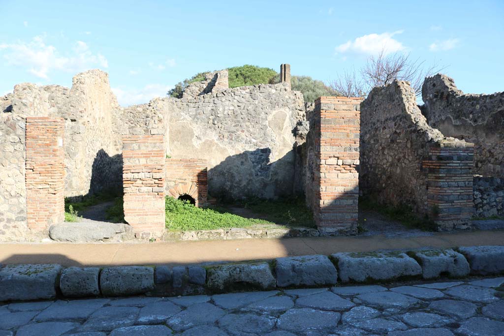 VIII.3.25, Pompeii, in centre. December 2018.
Looking towards entrance doorways on east side of Via delle Scuole. Photo courtesy of Aude Durand.