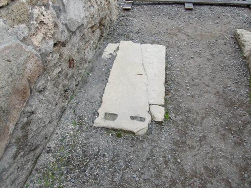 VIII.3.27 Pompeii. December 2007. Floor of fauces with marble door base.