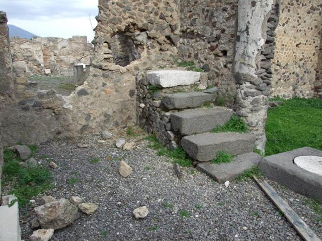VIII.3.27 Pompeii. December 2007. Stone staircase to upper floor on north side of pseudoperistyle.