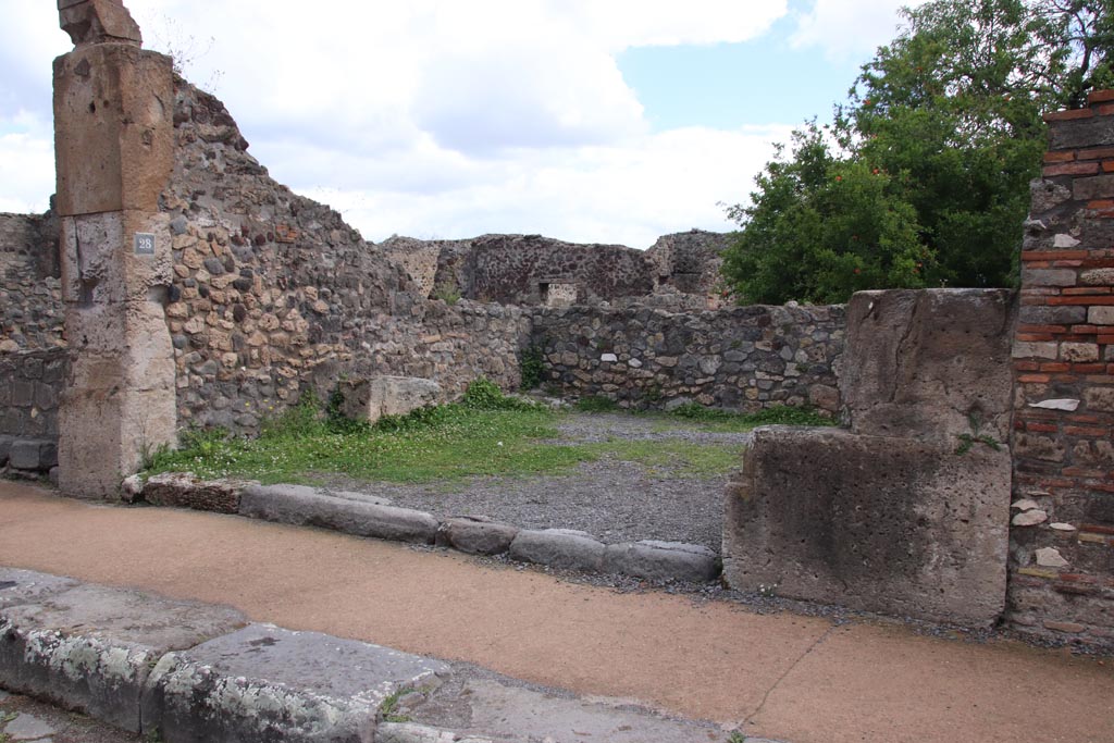 VIII.3.28 Pompeii. May 2024.
Looking towards entrance doorway on east side of Via delle Scuole. Photo courtesy of Klaus Heese.