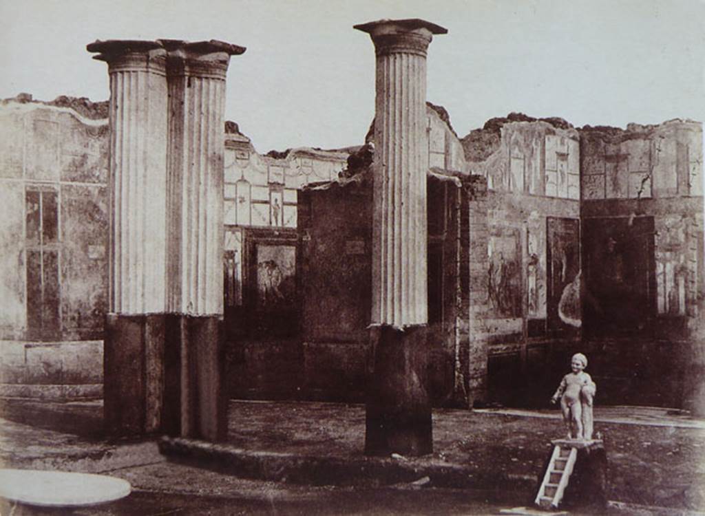 VIII.4.4 Pompeii. South-east corner of peristyle, with doorways to rooms 10 and 11.
Old undated picture showing the painted decorations on the walls.
For a description of the paintings found in these rooms, see Richardson.
See Richardson, L., 2000. A Catalog of Identifiable Figure Painters of Ancient Pompeii, Herculaneum. Baltimore: John Hopkins.(p.97)