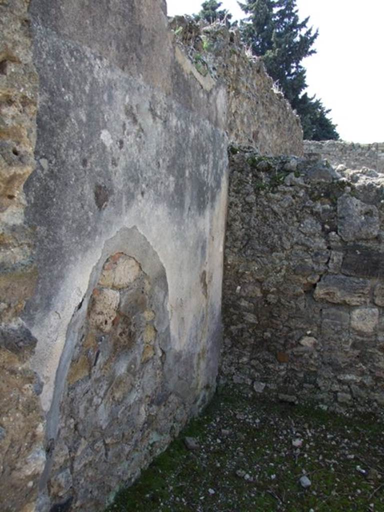VIII.4.4 Pompeii. March 2009. Room 15. South west corner, with remains of wall plaster.