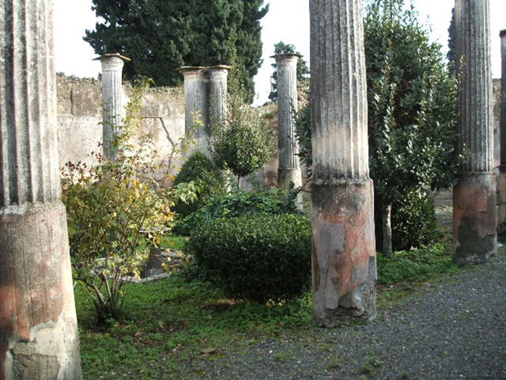 VIII.4.4 Pompeii. December 2004. Looking south east across peristyle from VIII.4.49.