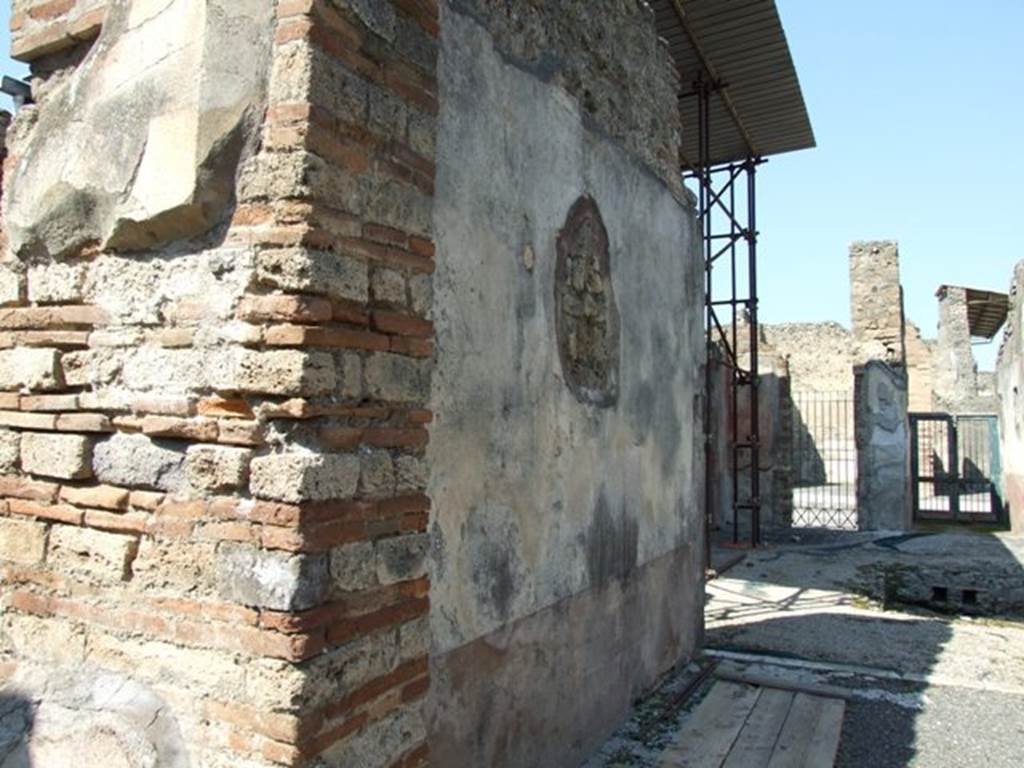 VIII.4.4 Pompeii. March 2009. Room 20, west wall of tablinum. Looking north.
According to Breton, on the west wall facing Leda, the painting was more or less destroyed when excavated.
One could only see a fragment of a sitting person, perhaps Adonis with a dog at his feet.
See Breton, Ernest. 1870. Pompeia, Guide de visite a Pompei, 3rd ed. Paris, Guerin.
See Helbig, W., 1868. Wandgemälde der vom Vesuv verschütteten Städte Campaniens. Leipzig: Breitkopf und Härtel. (961 Endymion?)
According to PPM, at the south end of the west wall in the yellow side panel was another vignette of the Seasons showing Summer (H 984).
Described by Minervini (BAI 1861, p.49) as “a naked female figure seen from the rear with cloth draped around her body and legs: in her right hand she held a branch/ear of corn, and a scythe in her left hand”.