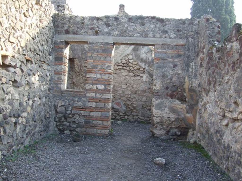 VIII.4.10 Pompeii. December 2007. Looking south to rear room. Boyce said, a window in the south wall was walled up, to form a niche according to Fiorelli.
See Boyce G. K., 1937. Corpus of the Lararia of Pompeii. Rome: MAAR 14. (p.76)
See Pappalardo, U., 2001. La Descrizione di Pompei per Giuseppe Fiorelli (1875). Napoli: Massa Editore. (p.128)