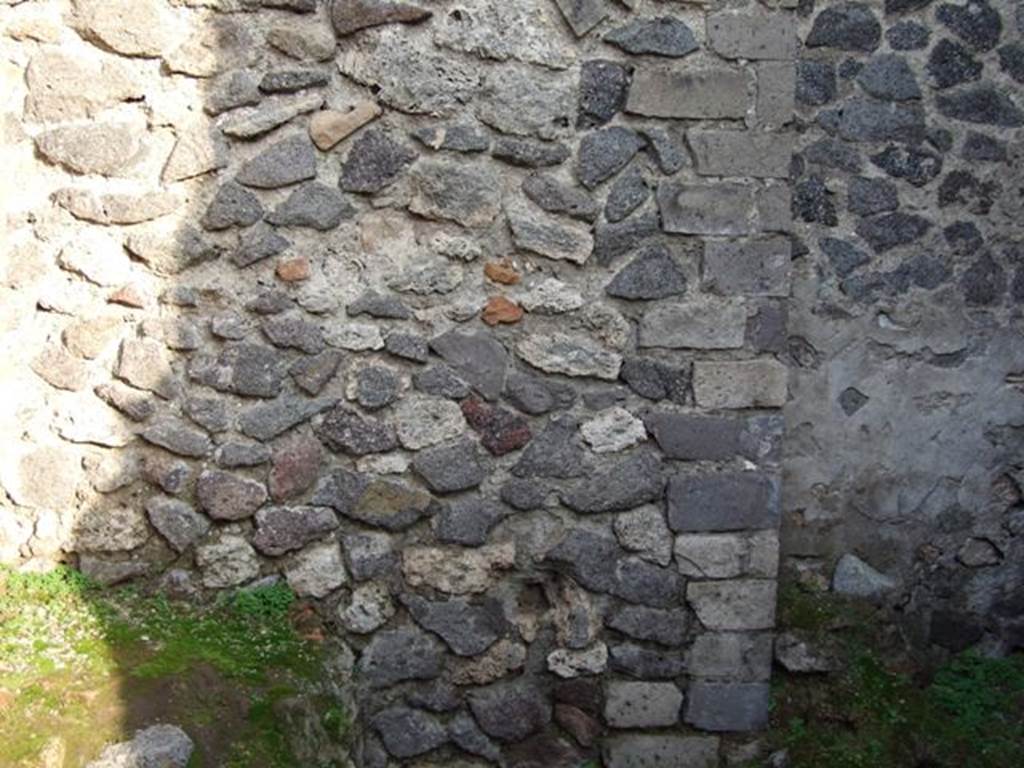 VIII.4.10 Pompeii. Shop and room. December 2007. East wall of rear room.