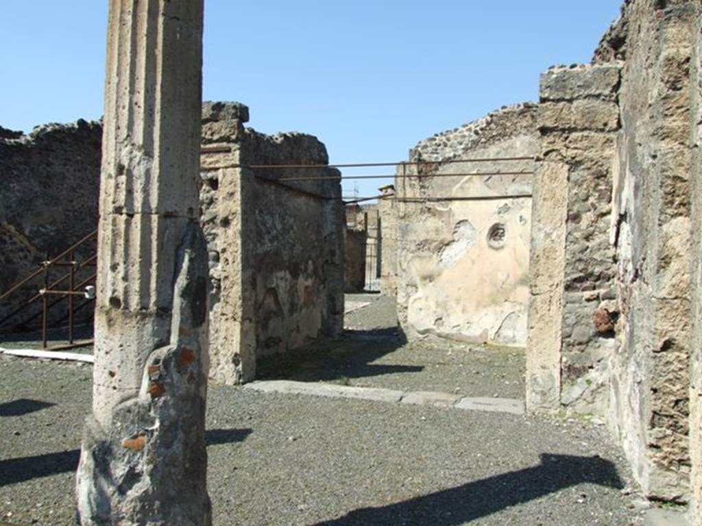 VIII.4.15 Pompeii. March 2009. Room 5, oecus. Looking north towards the north-east corner of the portico, the oecus, and the small doorway into the atrium. According to Fiorelli, when excavated this oecus had two paintings on its walls. He thought one was Paris and Oenone.
The other representing two bearded men talking together and accompanying their words with gestures. Helbig wrote, this room had paintings of Paris and Oenone (1280) and the other was unclear (1398).
See Helbig, W., 1868. Wandgemälde der vom Vesuv verschütteten Städte Campaniens. Leipzig: Breitkopf und Härtel.
See Pappalardo, U., 2001. La Descrizione di Pompei per Giuseppe Fiorelli (1875). Napoli: Massa Editore. (p.129)