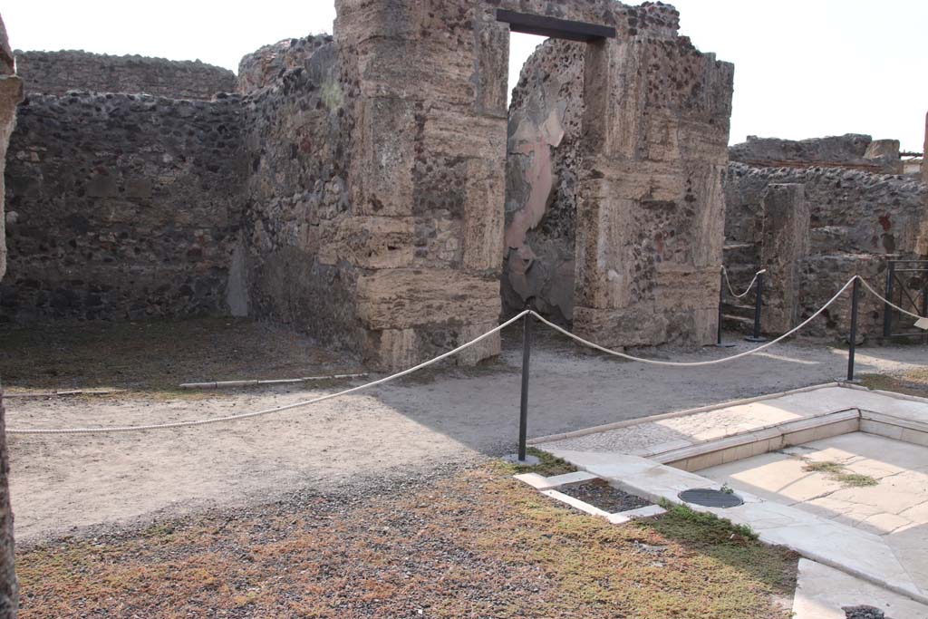 VIII.4.15 Pompeii. September 2021.
Looking west across atrium towards rooms 8, 9, and 10 on west side of atrium. Photo courtesy of Klaus Heese.