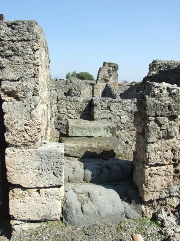 VIII.4.15 Pompeii. March 2009. Steps to upper floor on east side of portico.