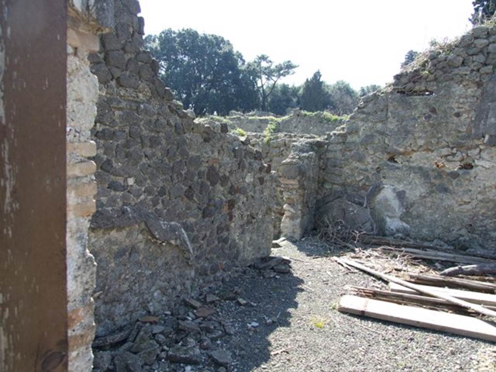 VIII.4.15 Pompeii. March 2009. Room 17, exedra. South wall, with door linking to VIII.4.30.