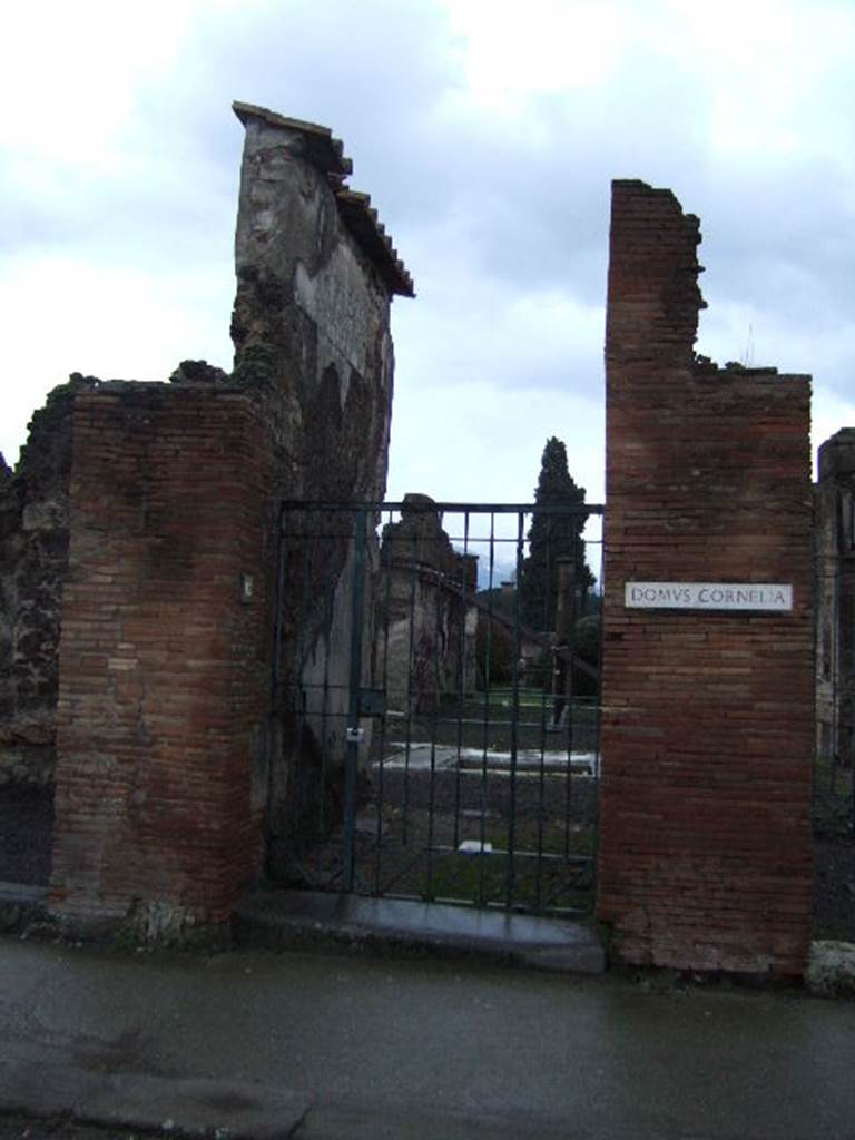 VIII.4.15 Pompeii.  December 2004.  Entrance. In September 1853, found on the pilaster, between VIII.4.15 and 14, on the right, painted in red and black, were:  M(arcum)  Holconium  Priscum
II vir(um)  d(ignum)  r(ei)  p(ublicae)  o(ro)  v(os)  f(aciatis)   [CIL IV 745]

L(ucium)  C(eium)  Secundum  Ii vir(um)  i(ure)  d(icundo)  o(ro)  v(os)  f(aciatis)   [CIL IV 746]

Painted in red, was:
C(aium)  C(alventium)  S(ittium)  M(agnum)
Fuscus  rog(at)   [CIL IV 747]

See Pagano, M. and Prisciandaro, R., 2006. Studio sulle provenienze degli oggetti rinvenuti negli scavi borbonici del regno di Napoli. Naples : Nicola Longobardi. (p.170)

According to Fiorelli the above CIL IV 746 was readable as:
L  . C .  SECVNDVM
II . VIR . I.  D. O. V. F.  VER  ET  ADIUTOR
                                             ROGANT
See Pappalardo, U., 2001. La Descrizione di Pompei per Giuseppe Fiorelli (1875). Napoli: Massa Editore. (P.129)



