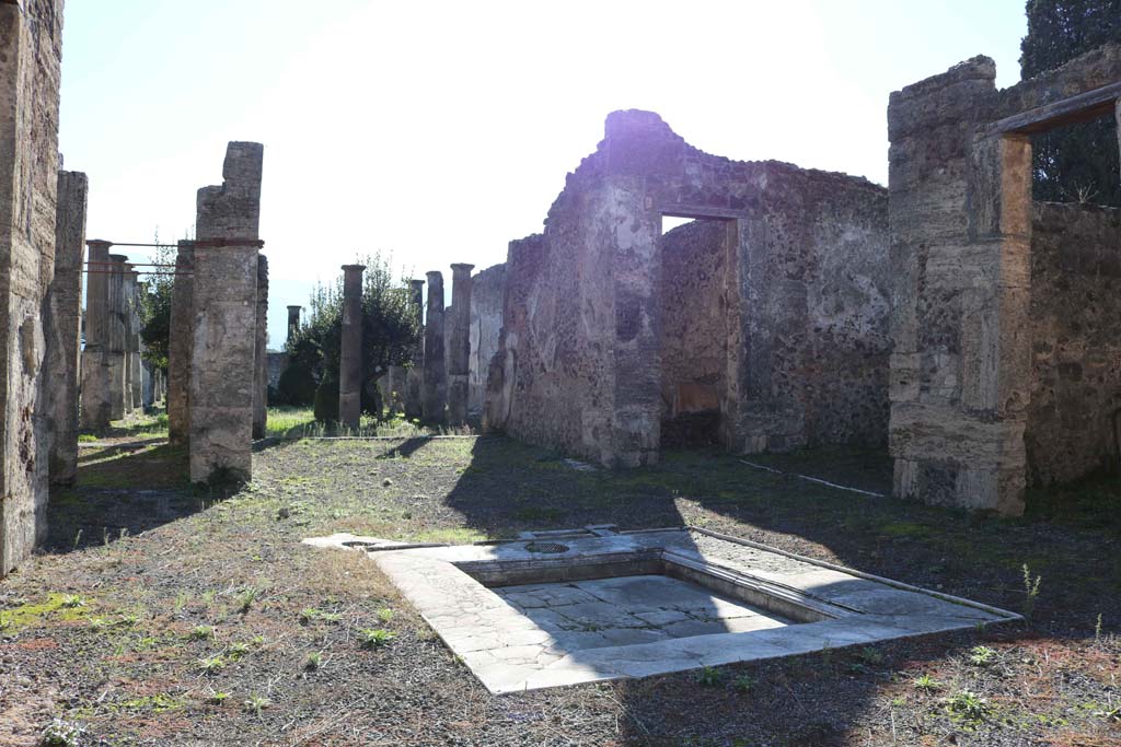 VIII.4.15 Pompeii December 2018.
Looking south-west across impluvium in atrium, towards tablinum and through to peristyle. Photo courtesy of Aude Durand.
