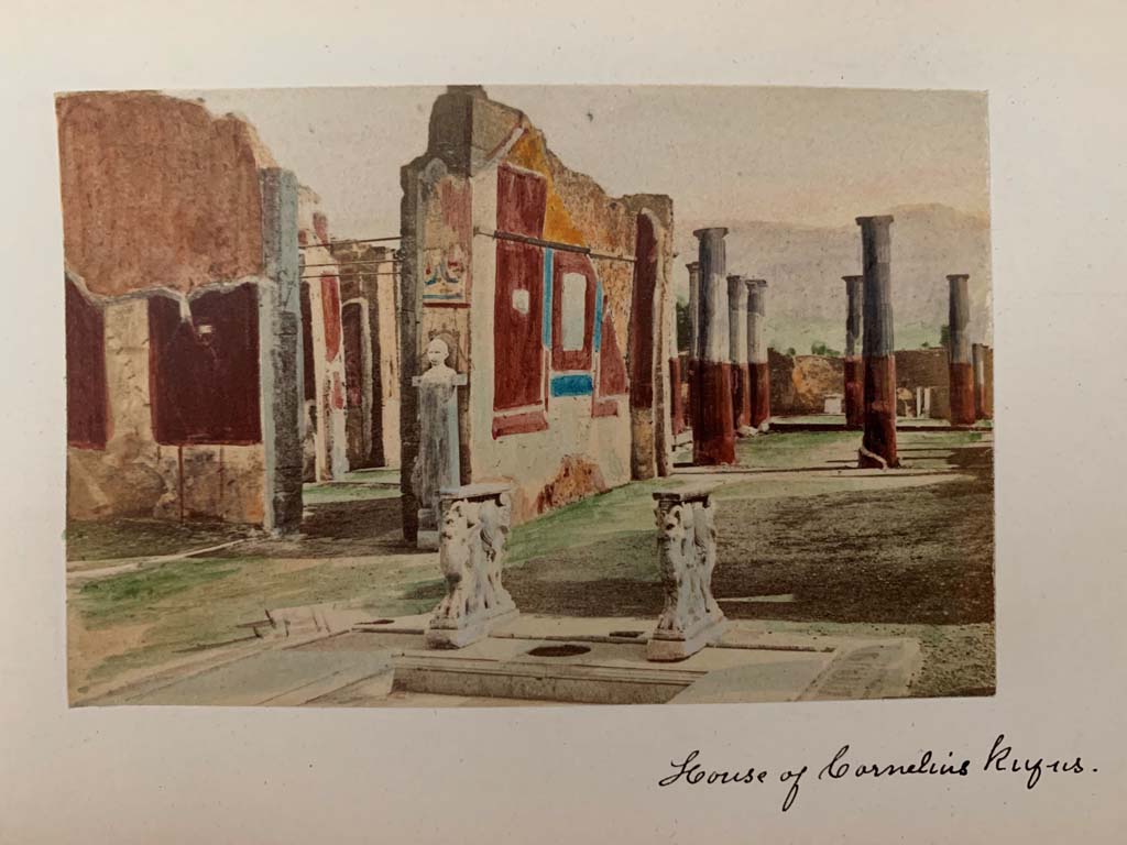 VIII.4.15 Pompeii. From a coloured album by M. Amodio, dated c.1880.
Room 1, atrium, looking south-east across impluvium, towards east wall of tablinum. Photo courtesy of Rick Bauer.