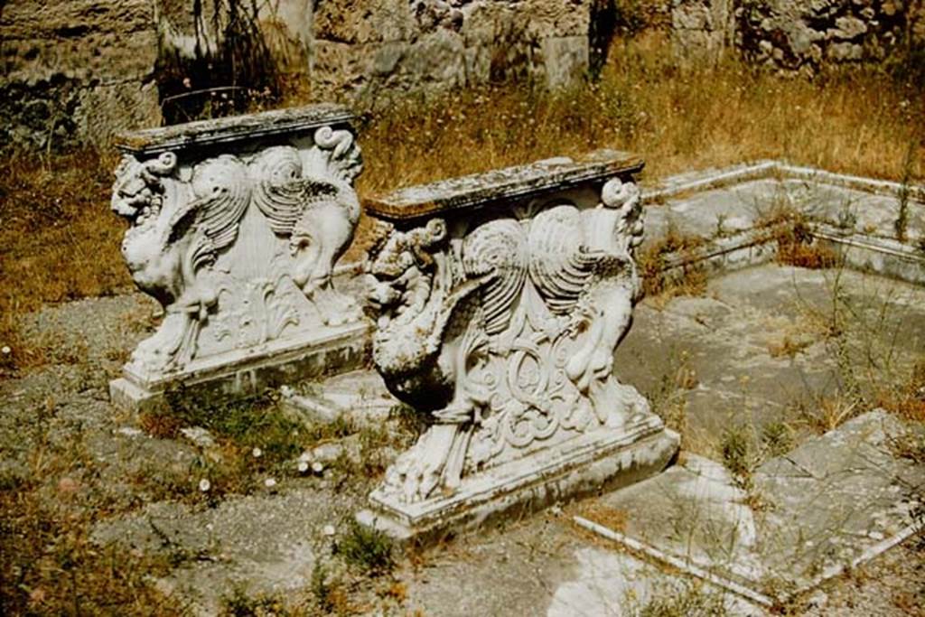 VIII.4.15 Pompeii. 1957. Table supports on south side of impluvium in atrium. Photo by Stanley A. Jashemski.
Source: The Wilhelmina and Stanley A. Jashemski archive in the University of Maryland Library, Special Collections (See collection page) and made available under the Creative Commons Attribution-Non Commercial License v.4. See Licence and use details.
J57f0121