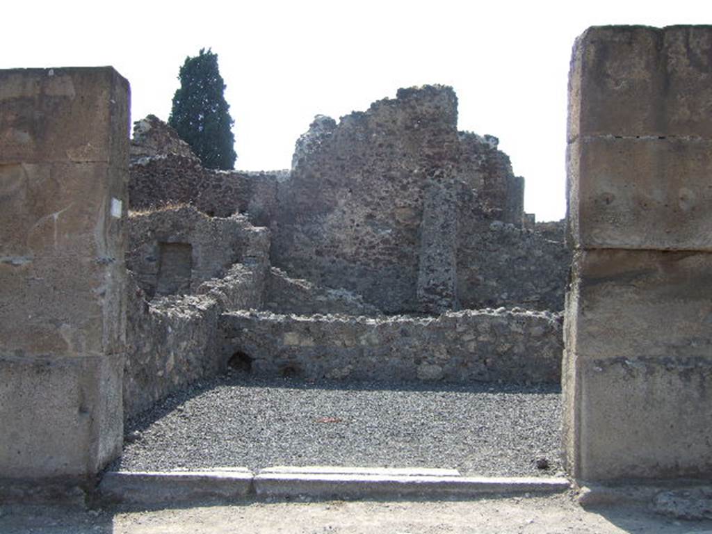 VIII.4.18 Pompeii. September 2005. Entrance on Via Stabiana.
Found in May 1853, painted on the pilaster, on the left, between VIII.4.19 and 18, were �

M(arcum)  Holconium
Priscum  aed(ilem)  o(ro)  v(os)  f(aciatis)  [CIL IV 981]

Sabinum  [CIL IV 982]

A(ulum) Vettium Felicem
aed(ilem) Ioi(...)ius rog(at) [CIL IV 983]

See Pagano, M. and Prisciandaro, R., 2006. Studio sulle provenienze degli oggetti rinvenuti negli scavi borbonici del regno di Napoli. Naples : Nicola Longobardi. (p.168)  
