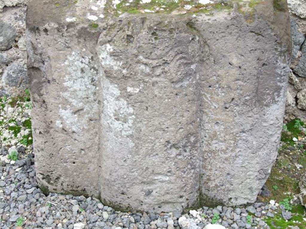 VIII.4.20 Pompeii. Shop and rooms. December 2007. Detail of tufa block with relief.