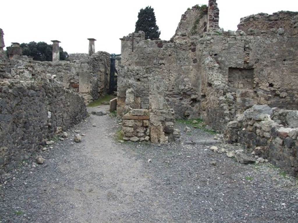 VIII.4.22 Pompeii. Shop and rooms. December 2007. Looking west across shop to two small rooms at rear.