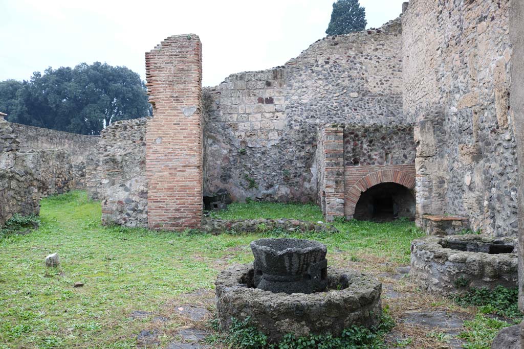 VIII.4.27 Pompeii. December 2018.
Looking west across bakery, with doorway to rear rooms, on left. Photo courtesy of Aude Durand.