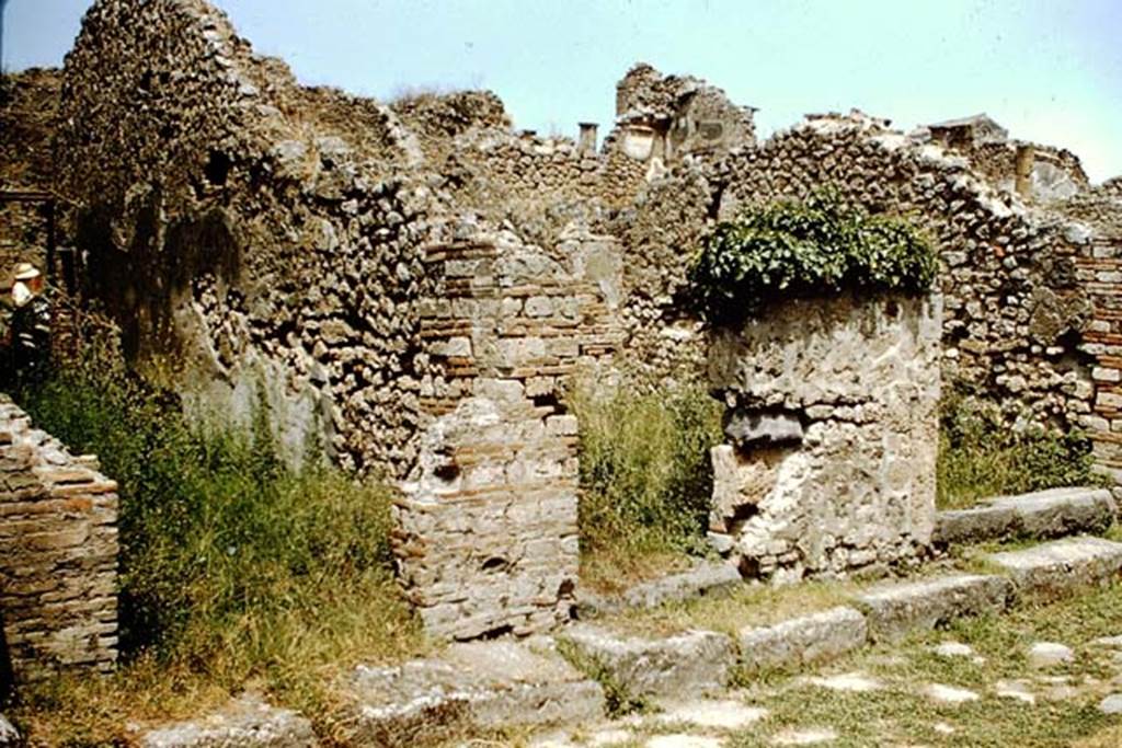 VIII.4.33 Pompeii on left, VIII.4.32 in centre, and VIII.4.31 on right. 1959.
Looking towards entrance doorways on Via del Tempio d’Iside. Photo by Stanley A. Jashemski.
Source: The Wilhelmina and Stanley A. Jashemski archive in the University of Maryland Library, Special Collections (See collection page) and made available under the Creative Commons Attribution-Non Commercial License v.4. See Licence and use details.
J59f0269