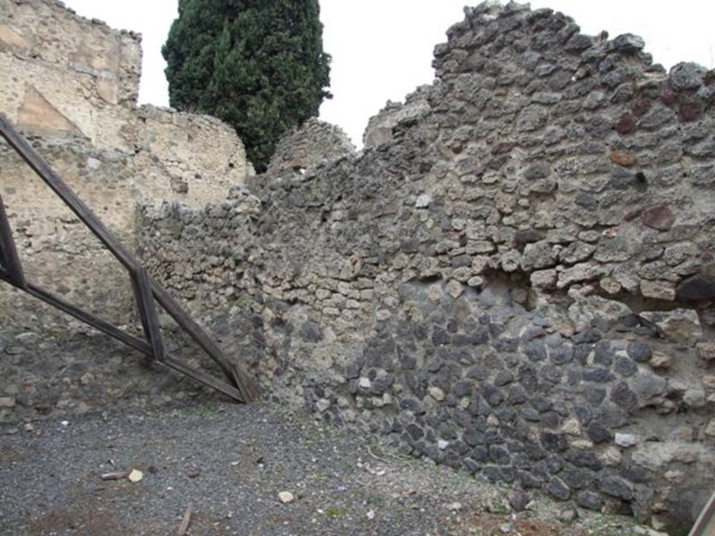 VIII.4.36 Pompeii. Shop and room. December 2007. East wall.