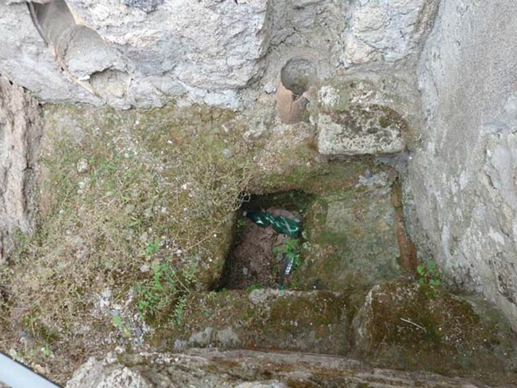 VIII.4.37 Pompeii. September 2015. Latrine, with remains of terracotta pipe from upper floor.
According to Hobson, this was a latrine with two down pipes and an upper storey latrine.
See Hobson, B. 2009. Pompeii, Latrines and Down Pipes. Oxford, Hadrian Books, p. 448.
See Eschebach, L., 1993. Gebäudeverzeichnis und Stadtplan der antiken Stadt Pompeji. Köln: Böhlau. (p.376-7)