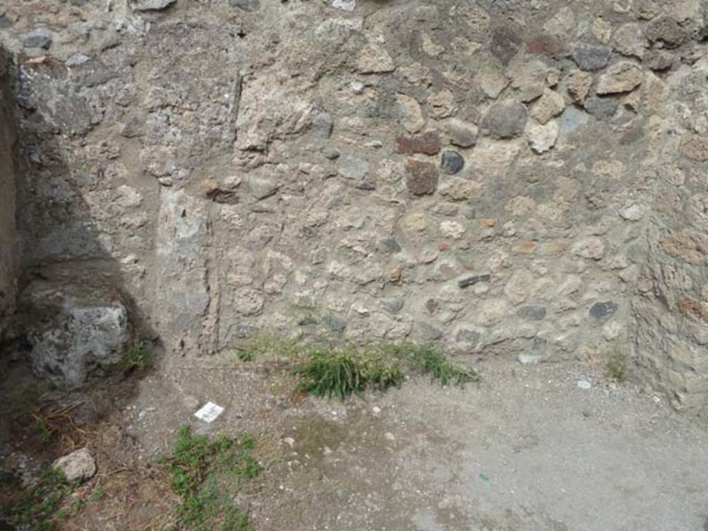VIII.4.44 Pompeii. September 2015. North wall of room at rear of triclinium, with line of stairs to upper floor.