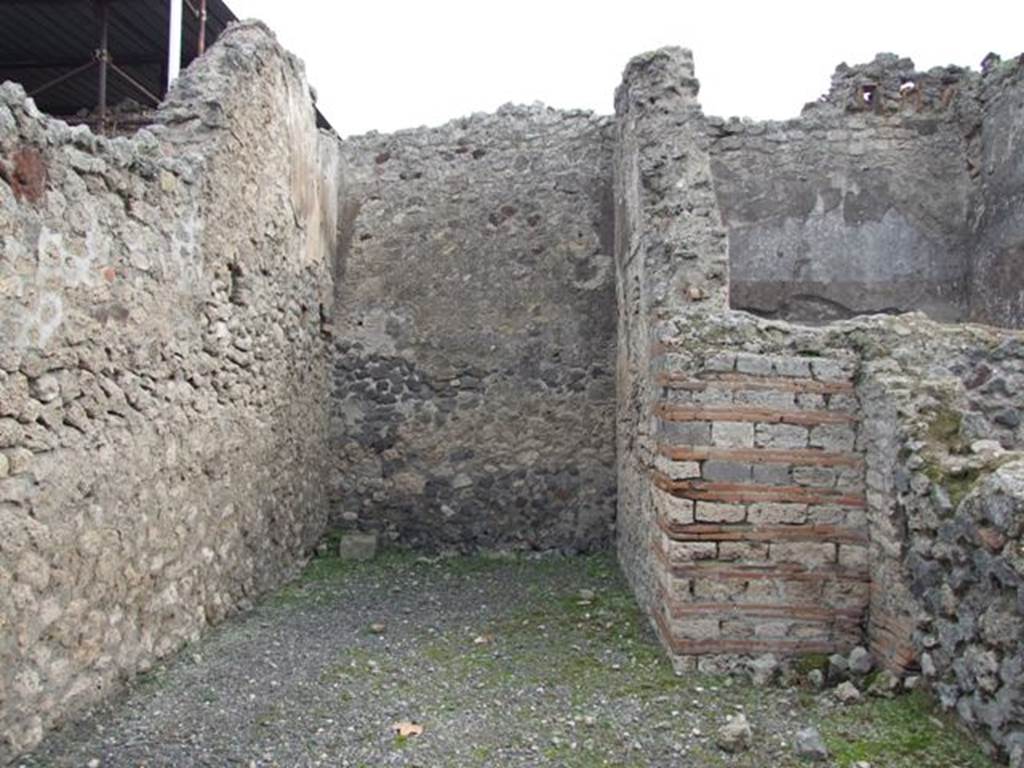 VIII.4.50 Pompeii. December 2007. Rear room and east wall. The stairs to the upper floor were In the rear room, and the latrine was under the stairs.
