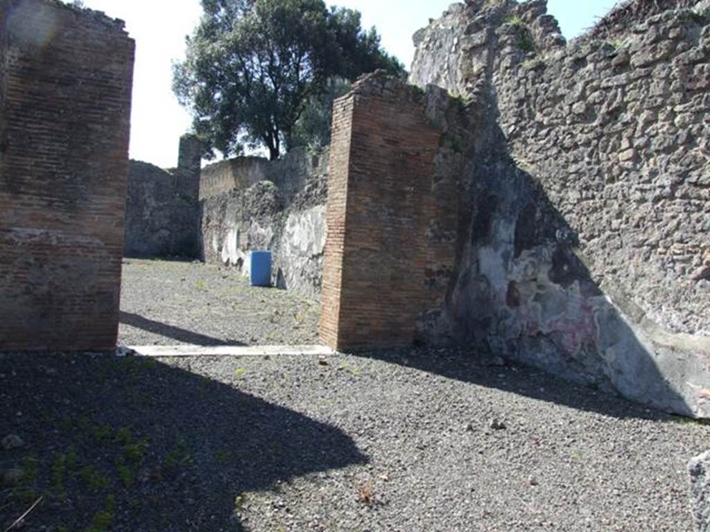 VIII.5.2 Pompeii. March 2009. Room 6. Oecus. Looking south to doorway to West Portico.