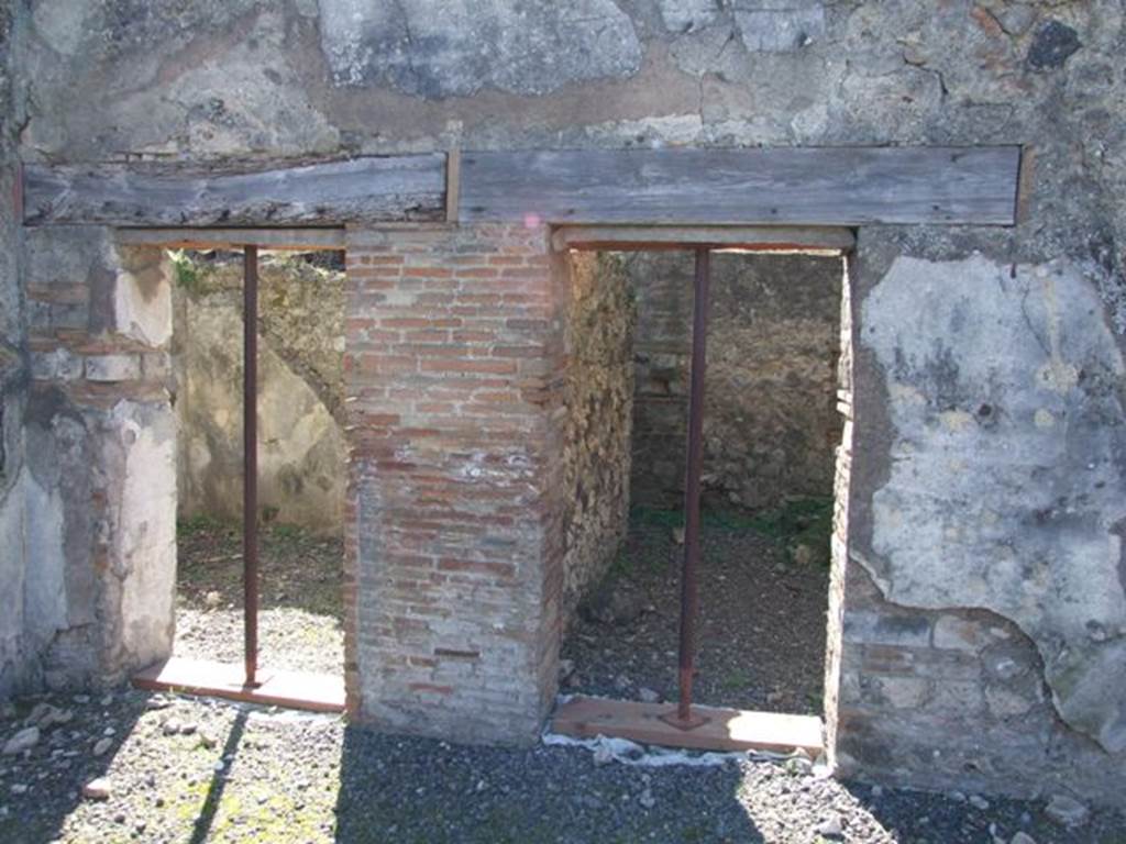 VIII.5.2 Pompeii. March 2009. Doorways to Rooms 12 and 9.