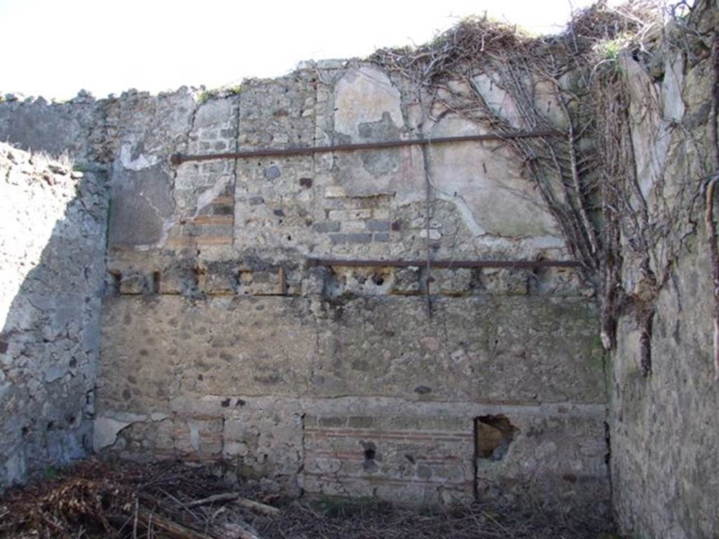 VIII.5.2 Pompeii. March 2009. Room 11. East wall, with remains of upper floor.