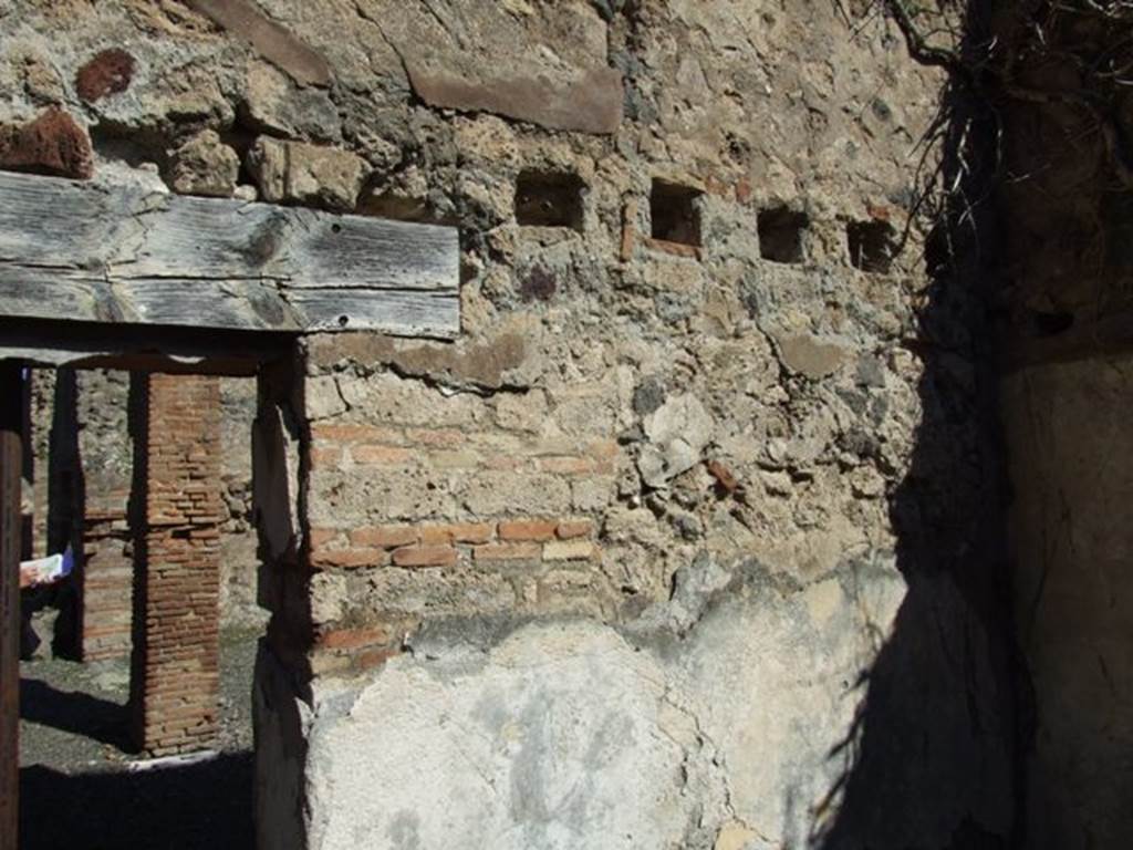 VIII.5.2 Pompeii. March 2009. Room 12. North wall, with Doorway to Portico.