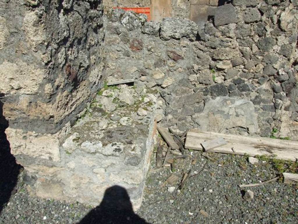 VIII.5.2 Pompeii. March 2009. Room 24. North wall, with small podium in north west corner.