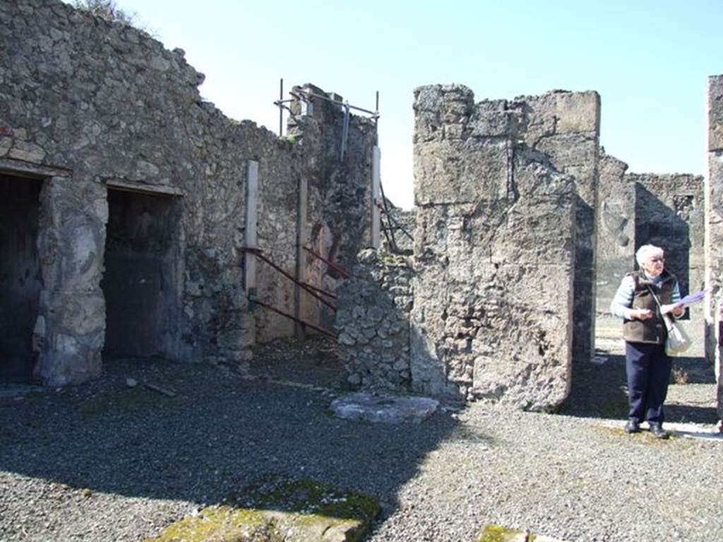 VIII.5.5 Pompeii. March 2009. Room 25. Atrium, looking south west to Doorways to Rooms 31, 27, 26 and 23.