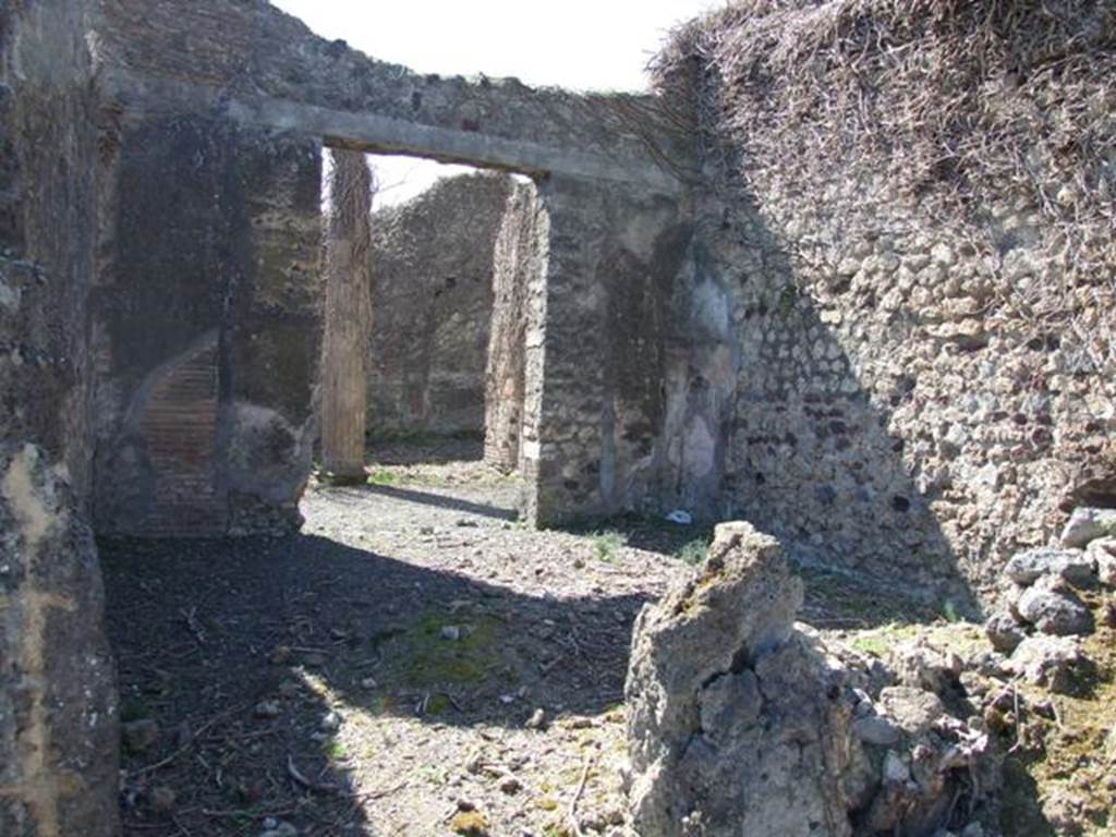 VIII.5.9 Pompeii. March 2009. Doorway in remains of south wall of Room 4, Ala, into Room 5, Triclinium.