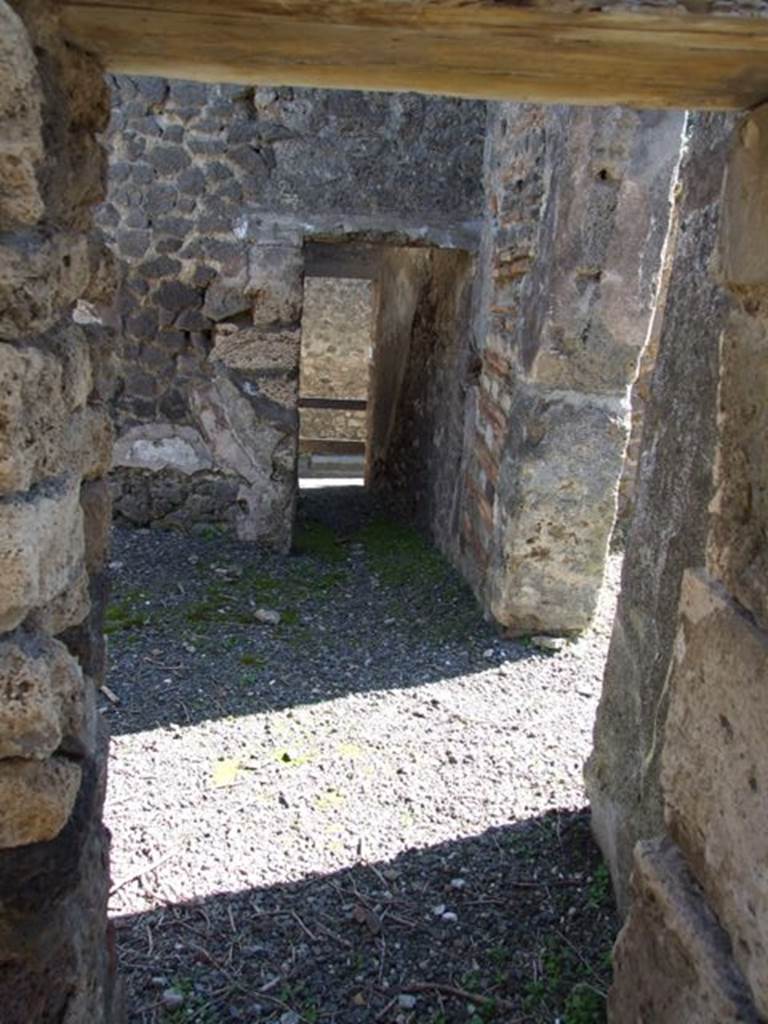 VIII.5.9 Pompeii. March 2009. Room 15. Corridor. Looking east to rear entrance at VIII.5.13