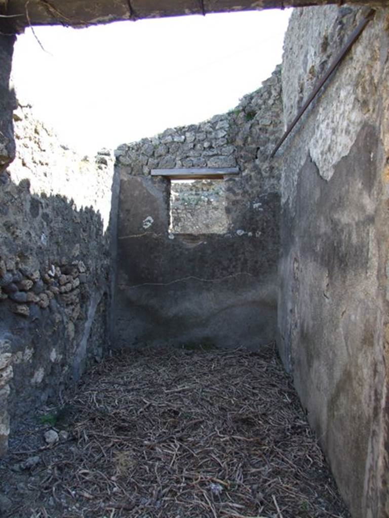 VIII.5.9 Pompeii. March 2009. Room 13. East wall with window onto small Vicolo.