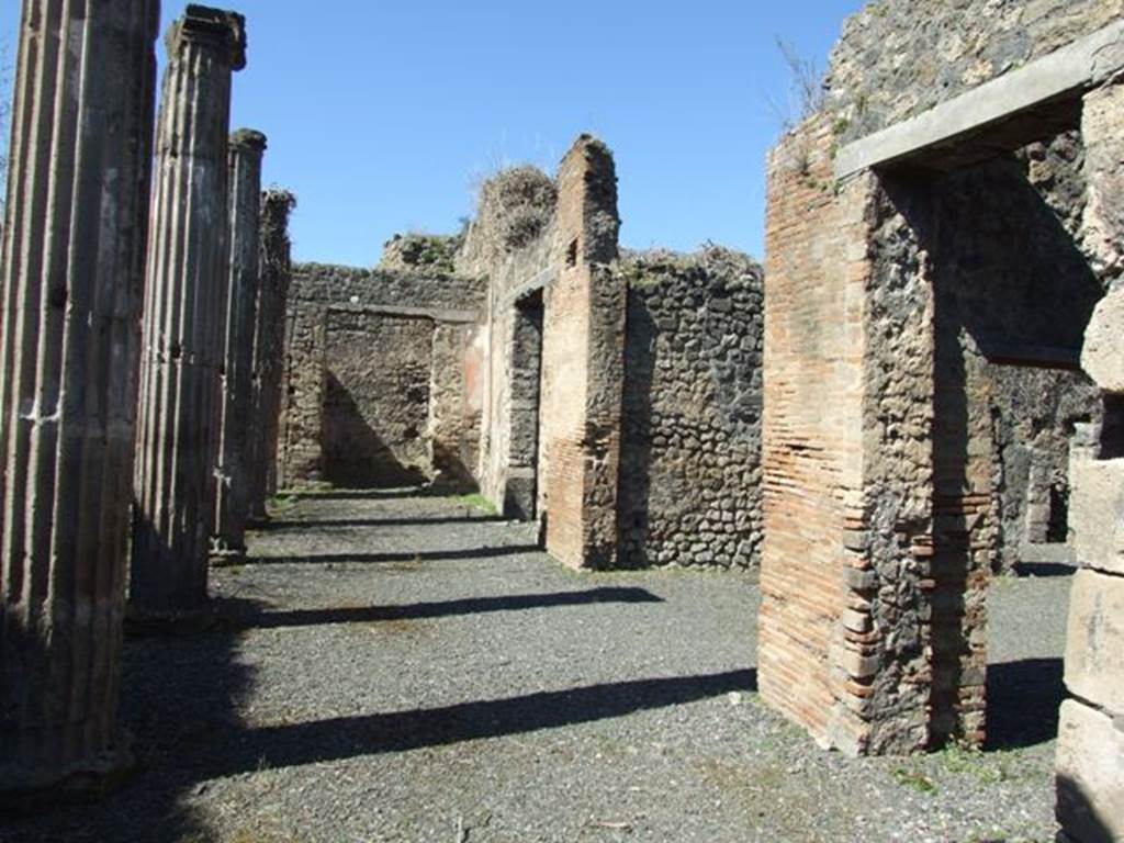 VIII.5.9 Pompeii. March 2009. Looking west across North Portico, wrth Doorways to Rooms 7, 6 and 5.