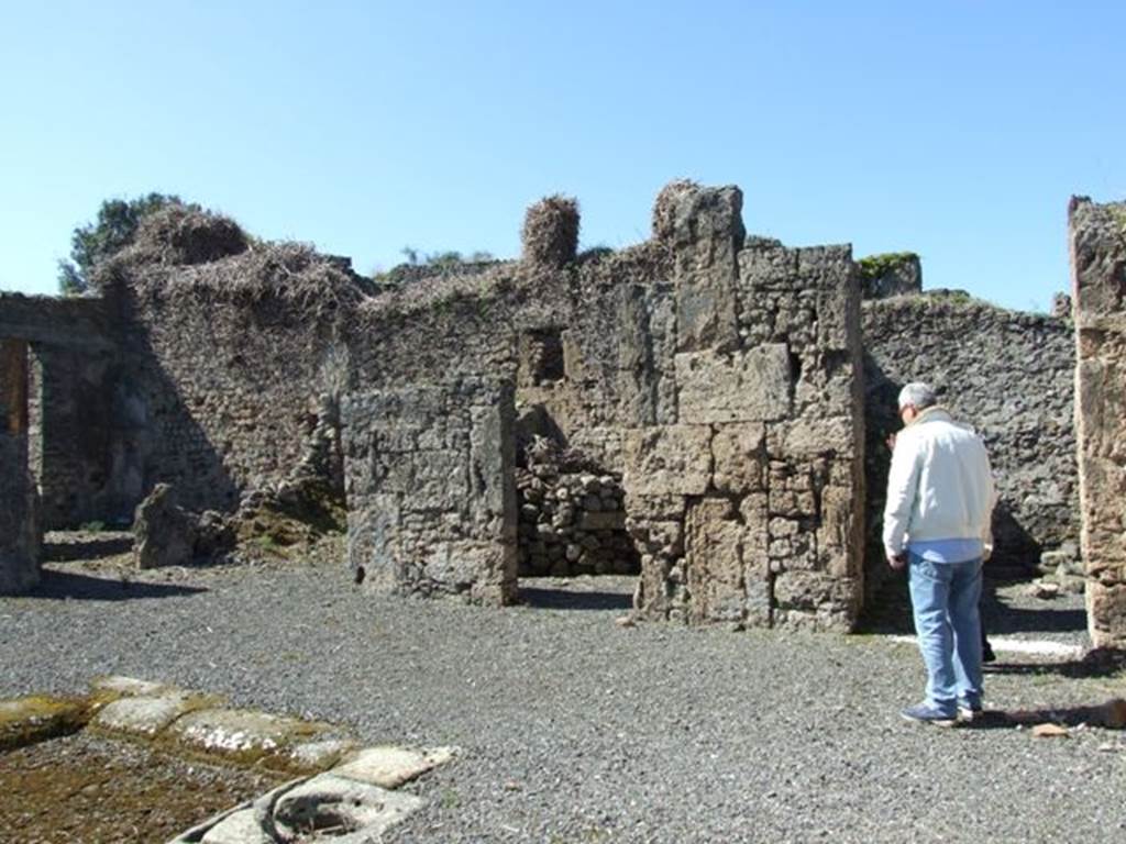 VIII.5.9 Pompeii. March 2009. Room 1, Atrium. West side with Doorways to Rooms 2, 3 and 4.