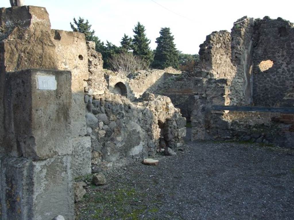 VIII.5.11 Pompeii. Shop. December 2007. East wall with entrance to VIII.5.12.