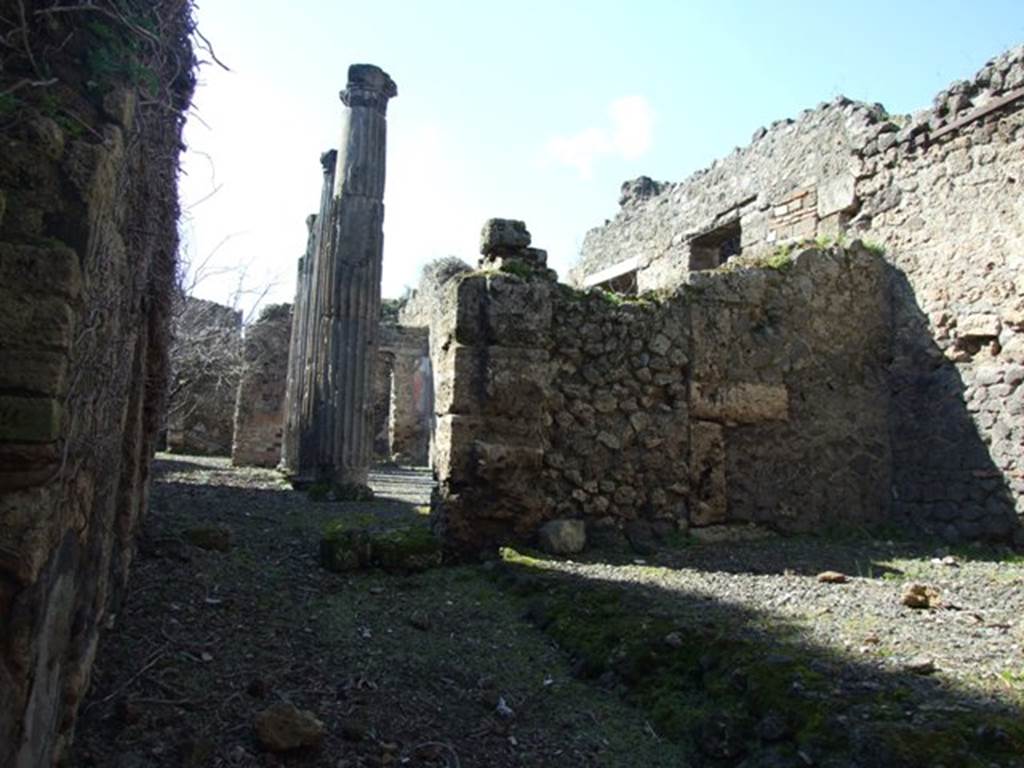 VIII.5.14 Pompeii. March 2009. Looking west from entrance, and room on north side of corridor.