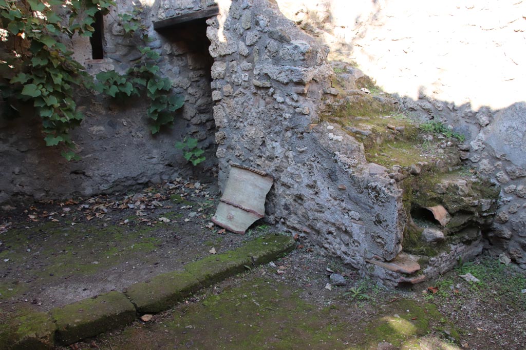 VIII.5.15 Pompeii. October 2022. Room 1, stairs to upper floor against north wall. Photo courtesy of Klaus Heese.