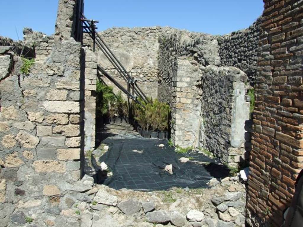 VIII.5.16 Pompeii. March 2009. Looking north through window from North Portico, to Room 3, Anteroom and Triclinium.