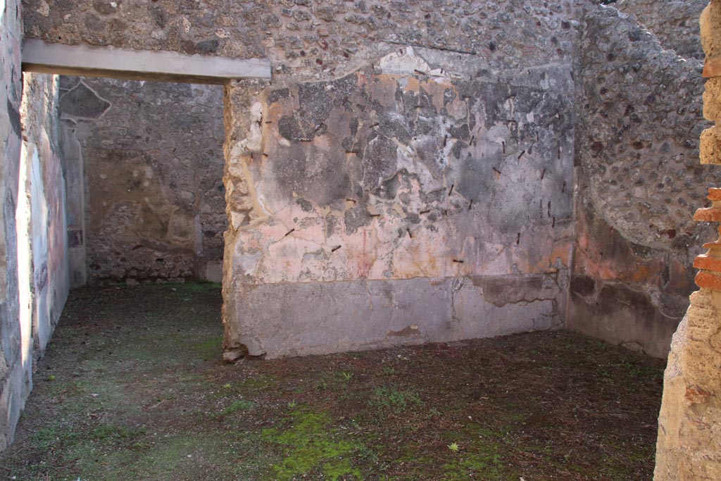 VIII.5.16 Pompeii. October 2022. Room 6, looking east from doorway through to doorway to room 7 in east wall.
Photo courtesy of Klaus Heese.