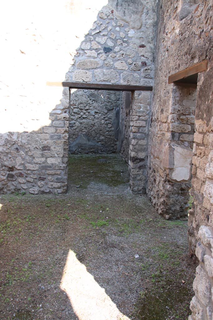 VIII.5.16 Pompeii. October 2022.
Room 9, looking through doorway to room 10 in north wall, and to room 11 in east wall, on right.
Photo courtesy of Klaus Heese.