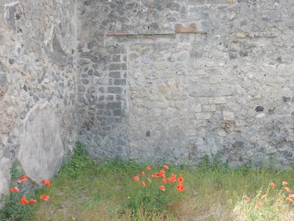 VIII.5.17 Pompeii. May 2017. Blocked doorway at east end of south wall. Photo courtesy of Buzz Ferebee.